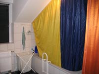 Badezimmer mit Wannenbad